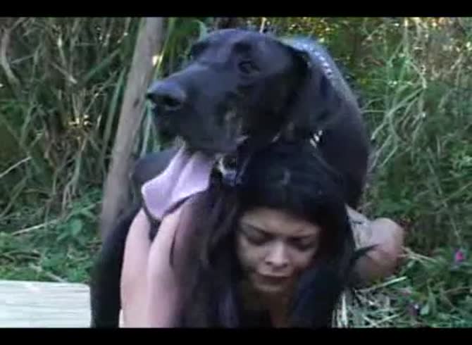 Video :Outdoor dog sex with k9 lady and black dog